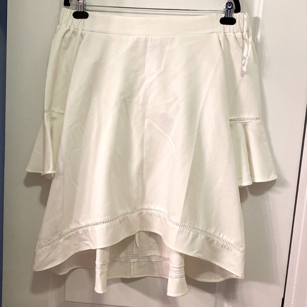 Off the shoulder tunic style top with flare